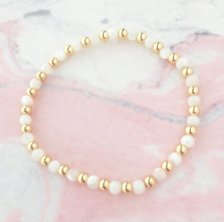 Aurora mother of pearl gold ball bracelet